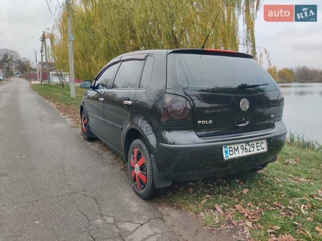 Черный Фольксваген Поло, объемом двигателя 1.4 л и пробегом 170 тыс. км за 5900 $, фото 4 на Automoto.ua