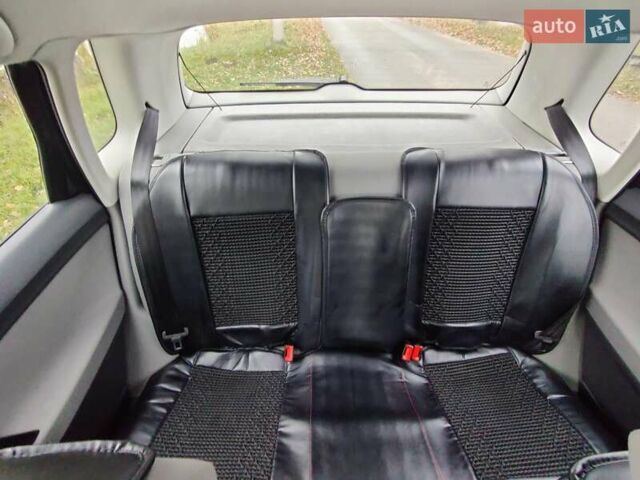 Черный Фольксваген Поло, объемом двигателя 1.4 л и пробегом 170 тыс. км за 5900 $, фото 21 на Automoto.ua