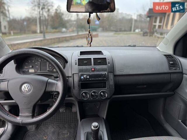 Черный Фольксваген Поло, объемом двигателя 1.4 л и пробегом 212 тыс. км за 4500 $, фото 13 на Automoto.ua