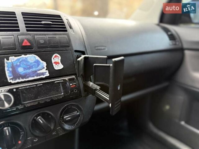 Чорний Фольксваген Поло, об'ємом двигуна 1.4 л та пробігом 327 тис. км за 3450 $, фото 20 на Automoto.ua