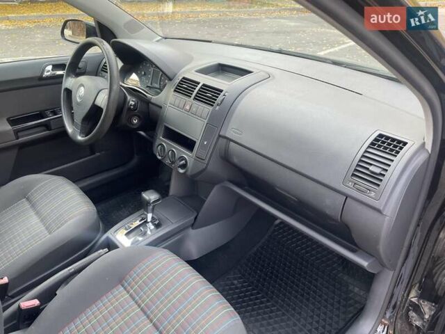 Черный Фольксваген Поло, объемом двигателя 1.4 л и пробегом 114 тыс. км за 6499 $, фото 22 на Automoto.ua