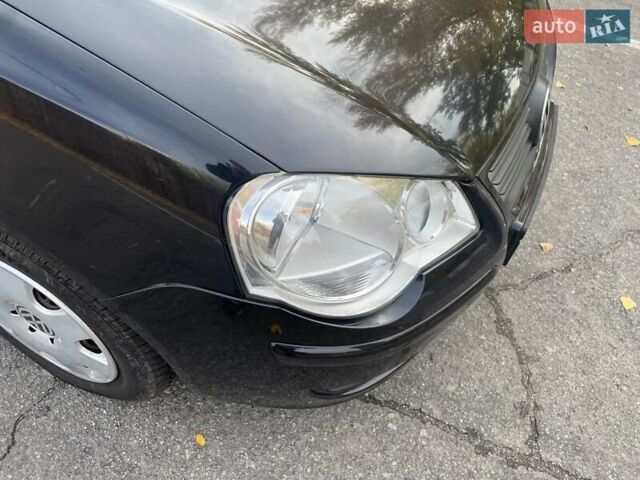 Черный Фольксваген Поло, объемом двигателя 1.4 л и пробегом 114 тыс. км за 6499 $, фото 24 на Automoto.ua