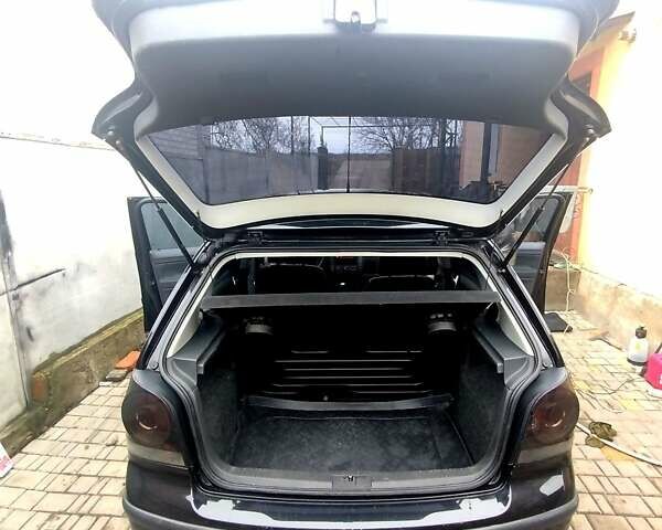 Черный Фольксваген Поло, объемом двигателя 1.4 л и пробегом 212 тыс. км за 4500 $, фото 17 на Automoto.ua