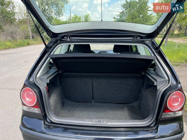 Чорний Фольксваген Поло, об'ємом двигуна 1.2 л та пробігом 234 тис. км за 4500 $, фото 4 на Automoto.ua