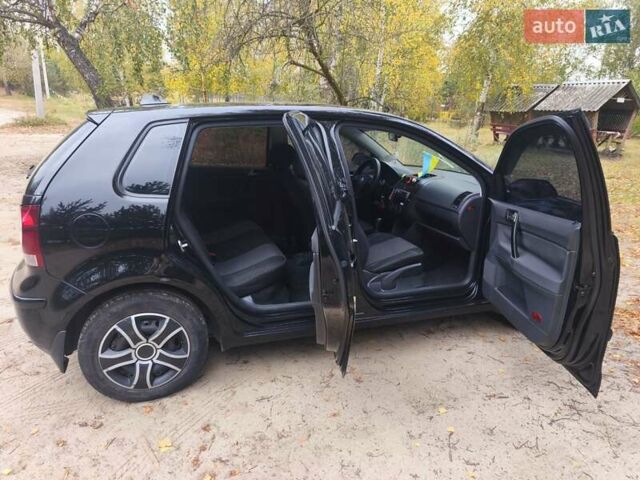 Черный Фольксваген Поло, объемом двигателя 1.4 л и пробегом 275 тыс. км за 4600 $, фото 3 на Automoto.ua