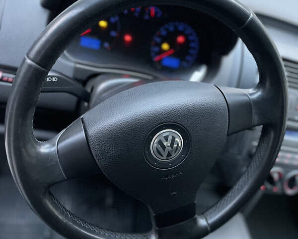 Чорний Фольксваген Поло, об'ємом двигуна 1.4 л та пробігом 197 тис. км за 5650 $, фото 23 на Automoto.ua