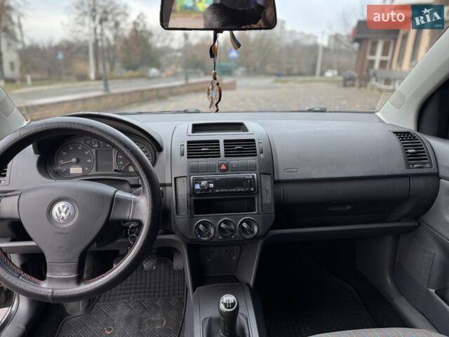 Черный Фольксваген Поло, объемом двигателя 1.4 л и пробегом 212 тыс. км за 4500 $, фото 18 на Automoto.ua
