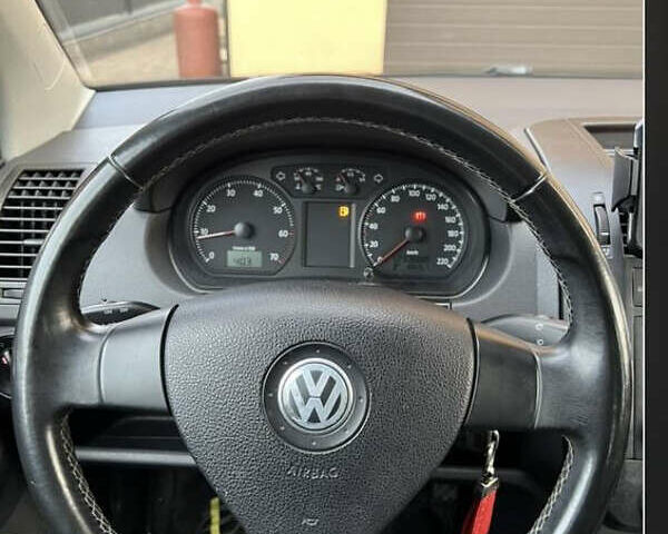 Черный Фольксваген Поло, объемом двигателя 1.4 л и пробегом 230 тыс. км за 5499 $, фото 14 на Automoto.ua