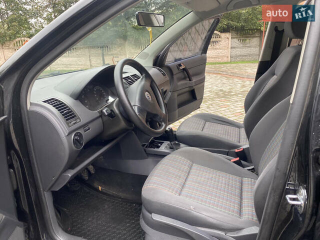 Черный Фольксваген Поло, объемом двигателя 1.39 л и пробегом 145 тыс. км за 3800 $, фото 8 на Automoto.ua