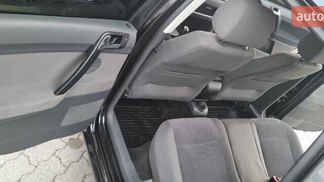 Черный Фольксваген Поло, объемом двигателя 1.6 л и пробегом 182 тыс. км за 5750 $, фото 2 на Automoto.ua