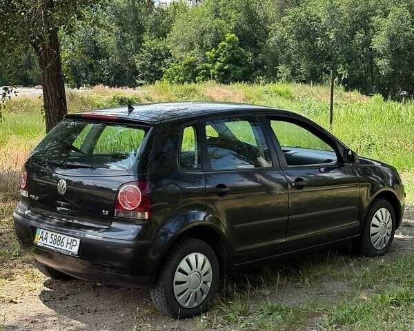 Черный Фольксваген Поло, объемом двигателя 1.4 л и пробегом 217 тыс. км за 3999 $, фото 7 на Automoto.ua