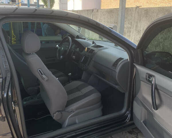 Черный Фольксваген Поло, объемом двигателя 1.2 л и пробегом 270 тыс. км за 4200 $, фото 14 на Automoto.ua