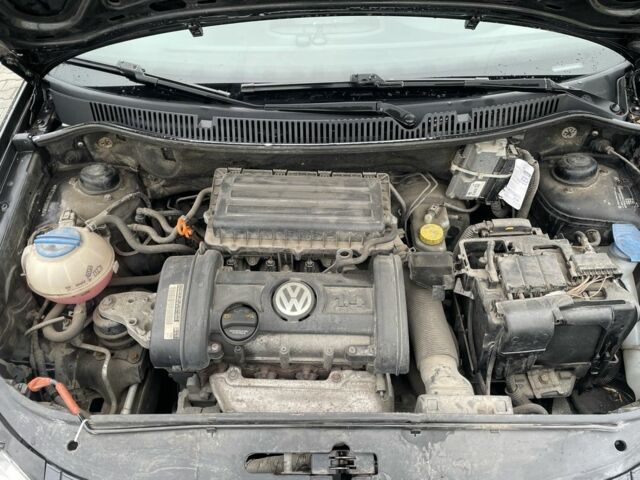 Черный Фольксваген Поло, объемом двигателя 1.4 л и пробегом 119 тыс. км за 6150 $, фото 6 на Automoto.ua