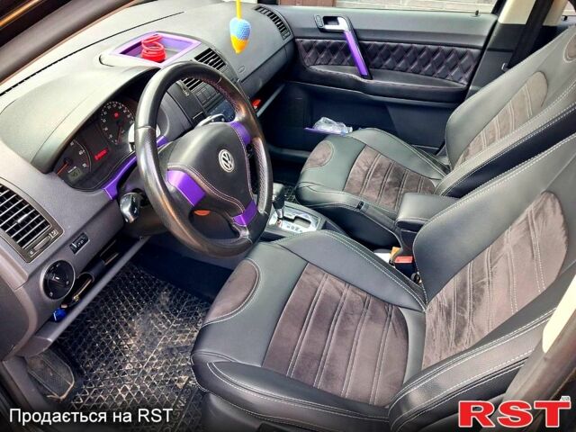 Чорний Фольксваген Поло, об'ємом двигуна 1.4 л та пробігом 191 тис. км за 6000 $, фото 4 на Automoto.ua