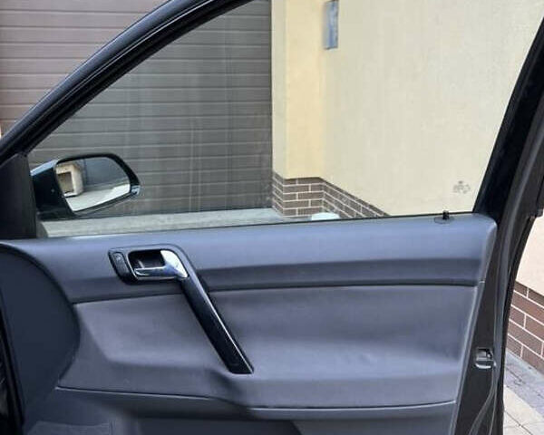 Черный Фольксваген Поло, объемом двигателя 1.4 л и пробегом 230 тыс. км за 5499 $, фото 8 на Automoto.ua