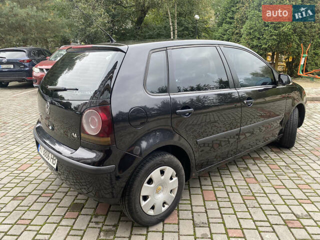 Черный Фольксваген Поло, объемом двигателя 1.39 л и пробегом 145 тыс. км за 3800 $, фото 1 на Automoto.ua