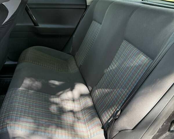 Черный Фольксваген Поло, объемом двигателя 1.4 л и пробегом 217 тыс. км за 3999 $, фото 1 на Automoto.ua