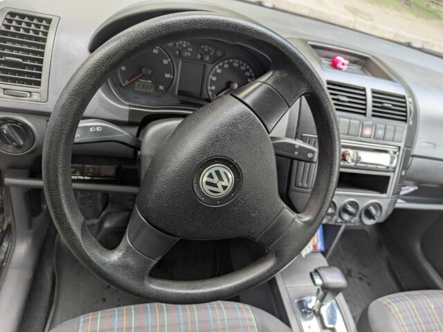 Черный Фольксваген Поло, объемом двигателя 1.4 л и пробегом 180 тыс. км за 6000 $, фото 11 на Automoto.ua