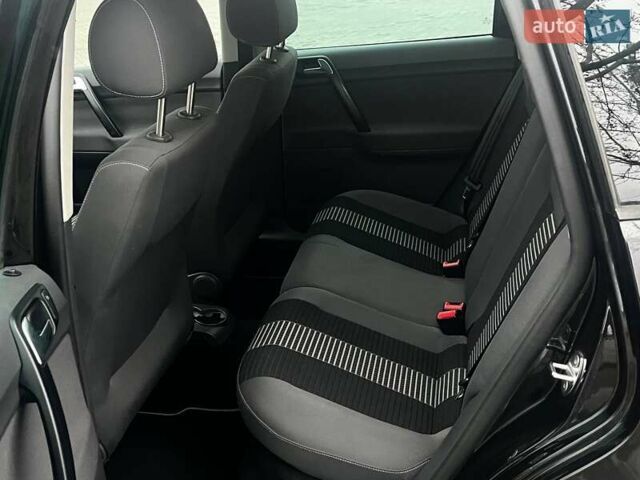 Черный Фольксваген Поло, объемом двигателя 1.4 л и пробегом 214 тыс. км за 5200 $, фото 11 на Automoto.ua