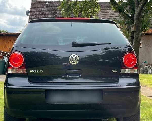 Черный Фольксваген Поло, объемом двигателя 1.2 л и пробегом 220 тыс. км за 4300 $, фото 4 на Automoto.ua