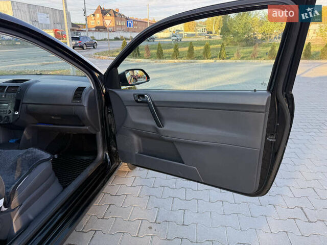 Чорний Фольксваген Поло, об'ємом двигуна 1.2 л та пробігом 228 тис. км за 4250 $, фото 17 на Automoto.ua