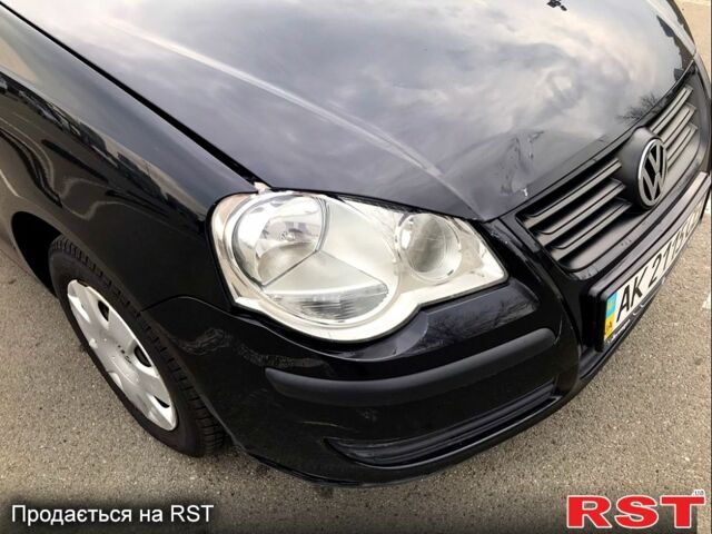 Черный Фольксваген Поло, объемом двигателя 1.4 л и пробегом 114 тыс. км за 3900 $, фото 5 на Automoto.ua