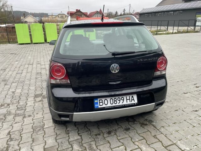 Черный Фольксваген Поло, объемом двигателя 1.4 л и пробегом 119 тыс. км за 6150 $, фото 2 на Automoto.ua