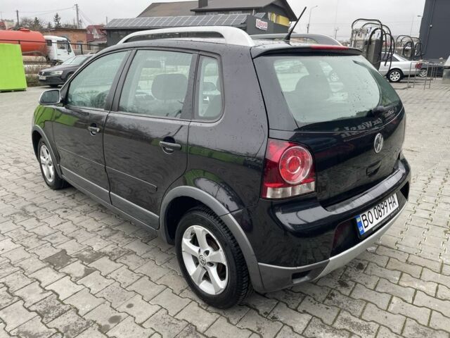 Черный Фольксваген Поло, объемом двигателя 1.4 л и пробегом 119 тыс. км за 6150 $, фото 1 на Automoto.ua