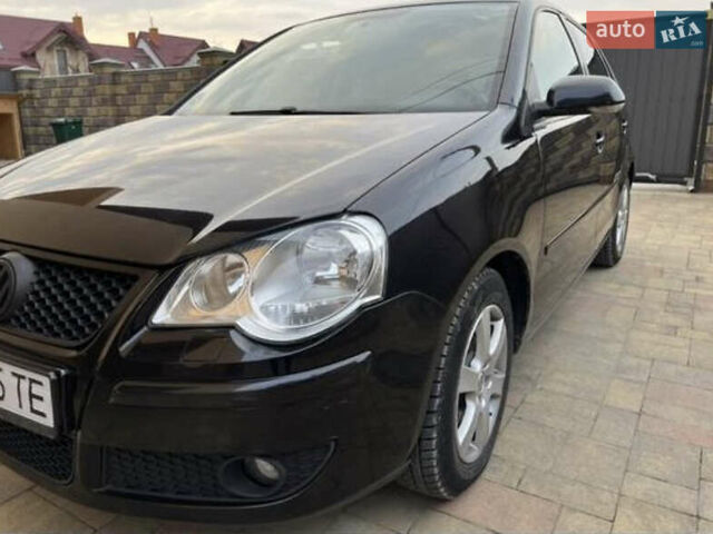 Черный Фольксваген Поло, объемом двигателя 1.4 л и пробегом 230 тыс. км за 5499 $, фото 4 на Automoto.ua