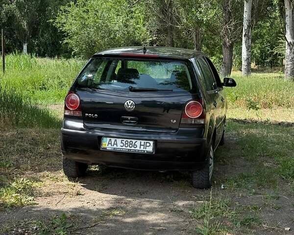 Черный Фольксваген Поло, объемом двигателя 1.4 л и пробегом 217 тыс. км за 3999 $, фото 4 на Automoto.ua