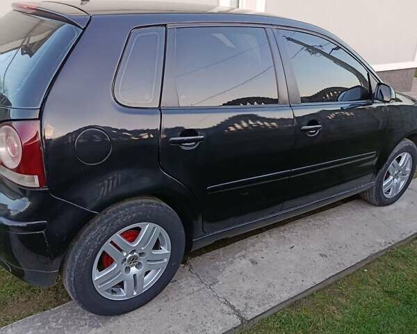 Чорний Фольксваген Поло, об'ємом двигуна 1.42 л та пробігом 302 тис. км за 4400 $, фото 6 на Automoto.ua