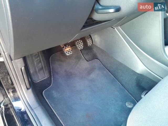 Черный Фольксваген Поло, объемом двигателя 1.2 л и пробегом 106 тыс. км за 5600 $, фото 13 на Automoto.ua