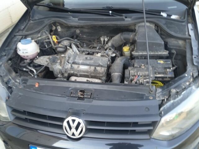 Черный Фольксваген Поло, объемом двигателя 1.2 л и пробегом 240 тыс. км за 4100 $, фото 7 на Automoto.ua