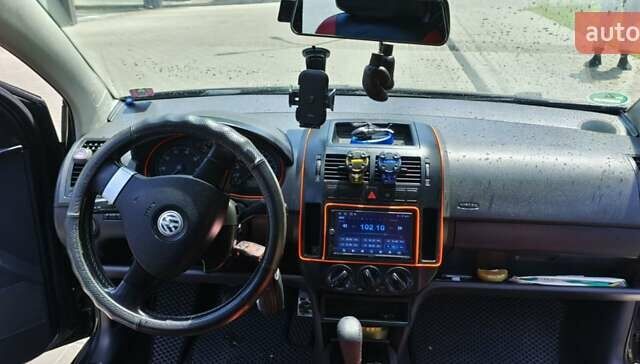 Чорний Фольксваген Поло, об'ємом двигуна 1.4 л та пробігом 283 тис. км за 4899 $, фото 2 на Automoto.ua