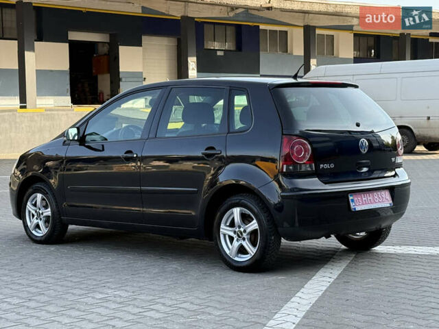 Черный Фольксваген Поло, объемом двигателя 1.4 л и пробегом 188 тыс. км за 4999 $, фото 7 на Automoto.ua