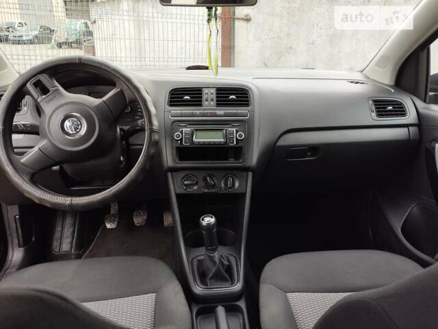 Чорний Фольксваген Поло, об'ємом двигуна 1.2 л та пробігом 142 тис. км за 6100 $, фото 6 на Automoto.ua