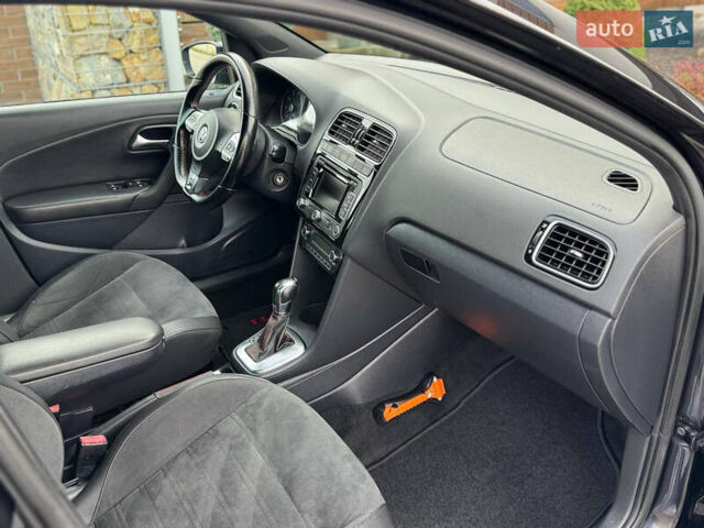 Черный Фольксваген Поло, объемом двигателя 1.4 л и пробегом 217 тыс. км за 9650 $, фото 64 на Automoto.ua