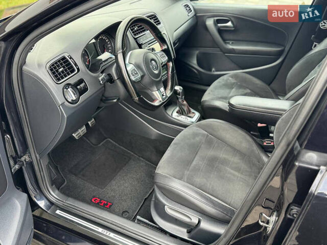 Черный Фольксваген Поло, объемом двигателя 1.4 л и пробегом 217 тыс. км за 9650 $, фото 41 на Automoto.ua