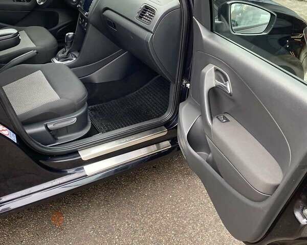 Черный Фольксваген Поло, объемом двигателя 1.39 л и пробегом 103 тыс. км за 7850 $, фото 3 на Automoto.ua