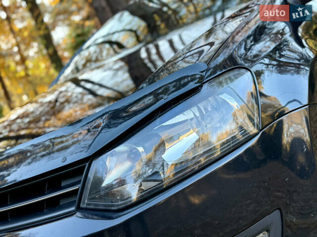 Черный Фольксваген Поло, объемом двигателя 1.39 л и пробегом 143 тыс. км за 7850 $, фото 4 на Automoto.ua