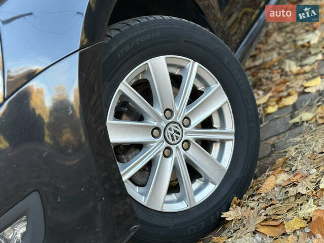 Черный Фольксваген Поло, объемом двигателя 1.39 л и пробегом 143 тыс. км за 7850 $, фото 7 на Automoto.ua