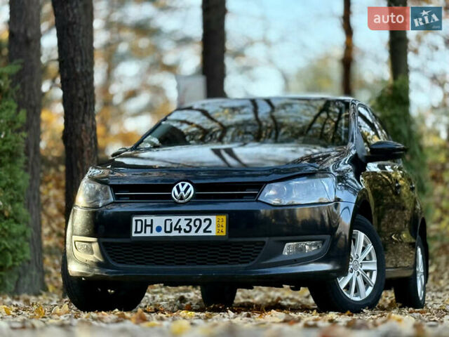 Черный Фольксваген Поло, объемом двигателя 1.39 л и пробегом 143 тыс. км за 7850 $, фото 2 на Automoto.ua