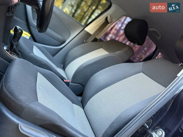 Черный Фольксваген Поло, объемом двигателя 1.39 л и пробегом 143 тыс. км за 7850 $, фото 36 на Automoto.ua