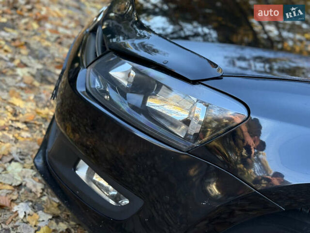 Черный Фольксваген Поло, объемом двигателя 1.39 л и пробегом 143 тыс. км за 7850 $, фото 8 на Automoto.ua