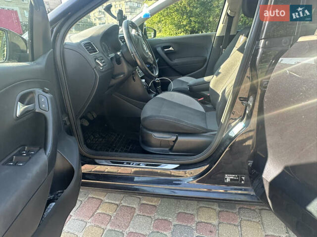 Черный Фольксваген Поло, объемом двигателя 1.2 л и пробегом 198 тыс. км за 7600 $, фото 13 на Automoto.ua