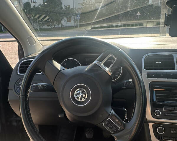 Черный Фольксваген Поло, объемом двигателя 1.2 л и пробегом 198 тыс. км за 7600 $, фото 11 на Automoto.ua