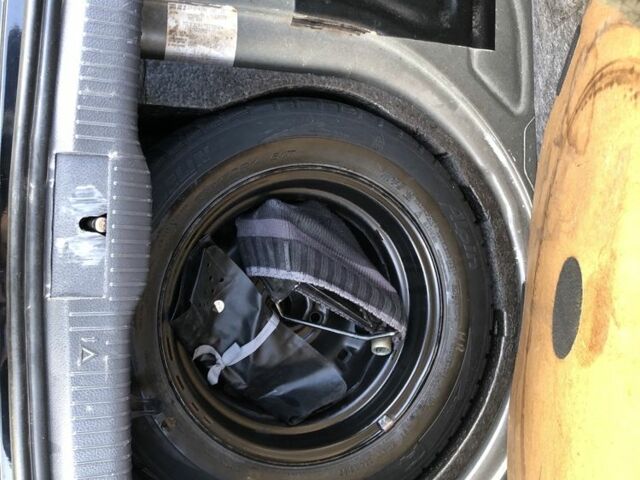 Черный Фольксваген Поло, объемом двигателя 1.4 л и пробегом 260 тыс. км за 3850 $, фото 14 на Automoto.ua