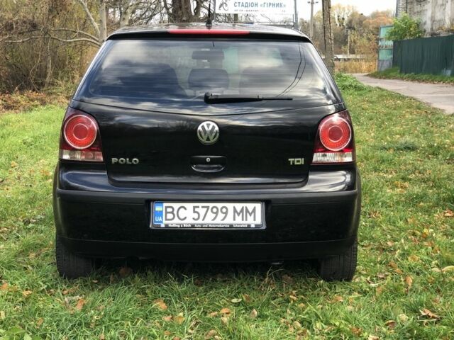 Черный Фольксваген Поло, объемом двигателя 1.4 л и пробегом 260 тыс. км за 3850 $, фото 4 на Automoto.ua