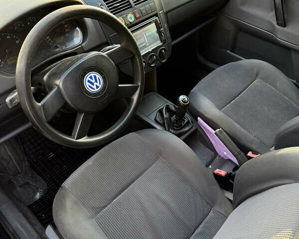 Черный Фольксваген Поло, объемом двигателя 1.4 л и пробегом 227 тыс. км за 2550 $, фото 9 на Automoto.ua