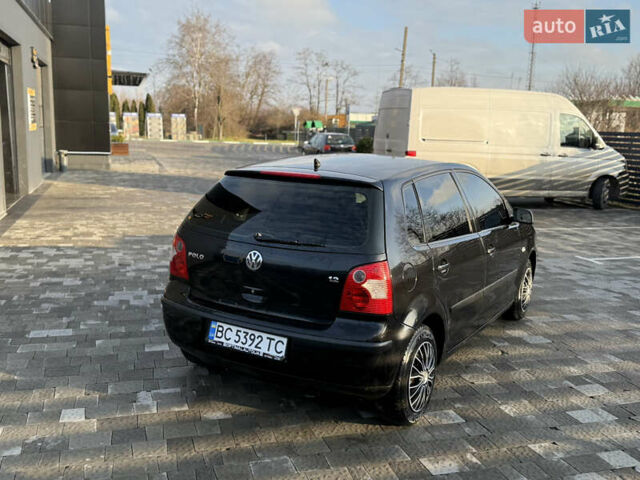 Черный Фольксваген Поло, объемом двигателя 1.4 л и пробегом 227 тыс. км за 2550 $, фото 1 на Automoto.ua